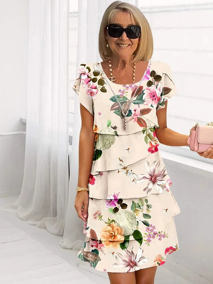 Stefania™ | Plissiertes Kleid mit Rüschen und Blumenmuster